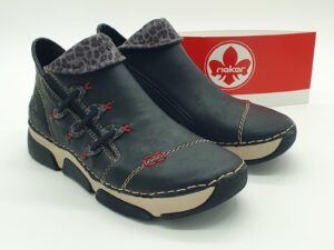 Boots femme zip/élastiques noir revers léopard gris RIEKER